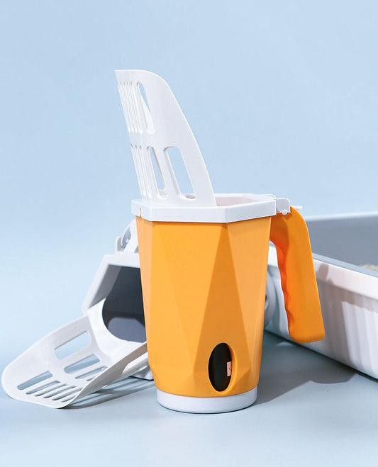 A yellow cat litter box scoop with a white handle, shown alongside a gray cat litter box partially filled with litter.