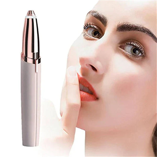 A woman holding a multipurpose eyebrow trimmer close to her face, with the trimmer featuring a pen-style design and a metallic finish.